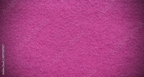 Purple pink background texture with dark vignette. Pink violet felt fabric background with copy space for design.  