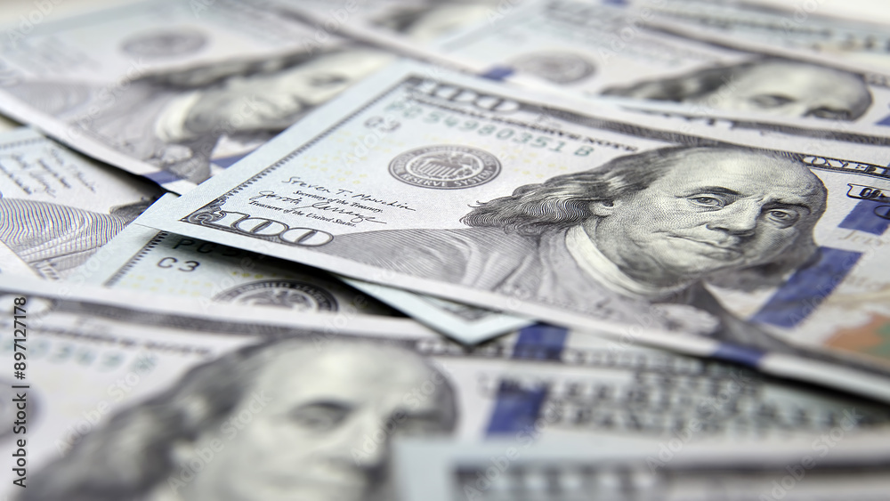 Close-up of cash American dollar bills. Concept nailed, finance and income. Close-up of cash American dollar bills. Concept nailed, finance and income.