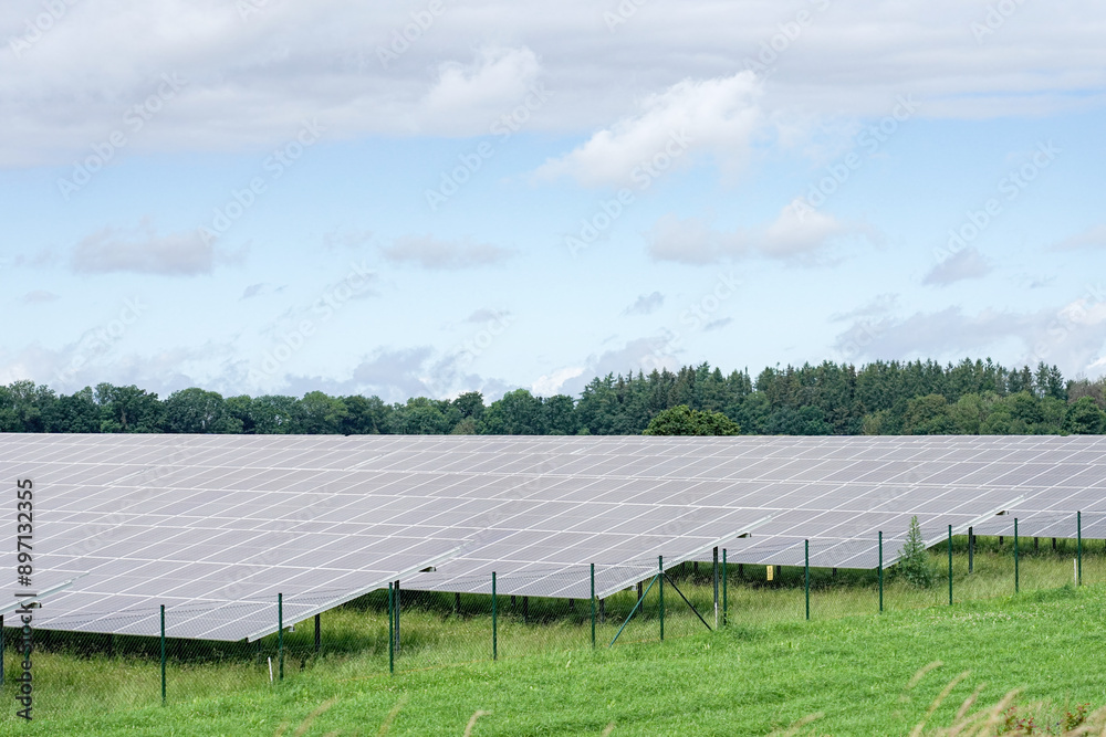 Solar panels in a field for industrial use of electricity. Solar panels in a field for industrial use of electricity.
