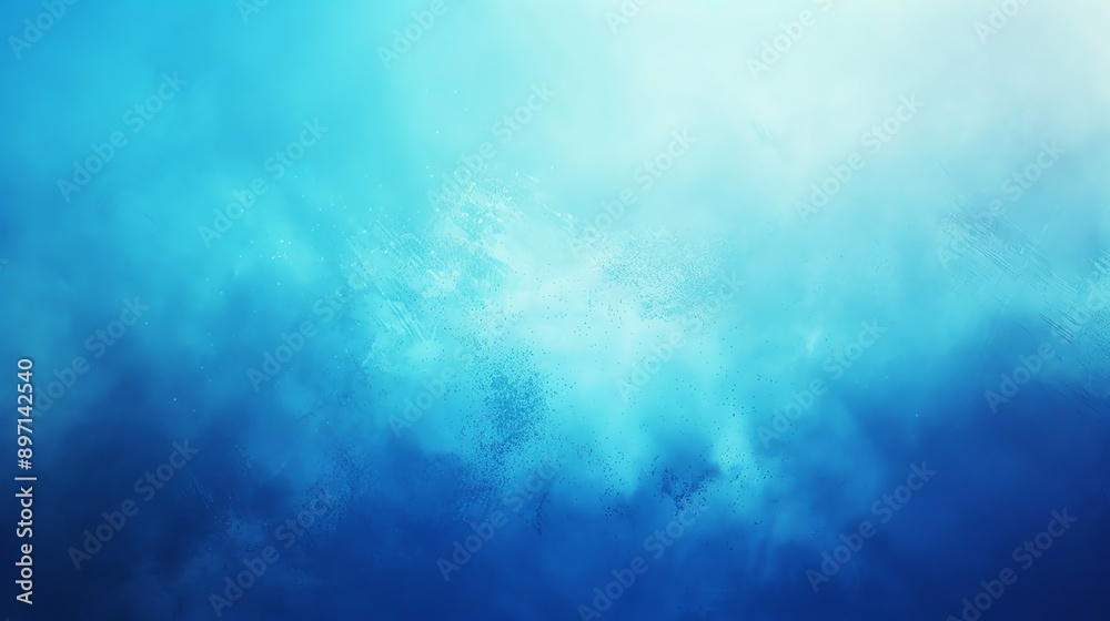 Obraz premium An abstract blue background with a gradient from light to dark blue.