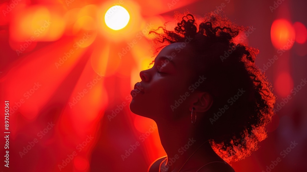 © aicandy - A serene moment of contemplation captured as a young person enjoys a peaceful moment amidst the vibrant red ambiance of a dreamy, demure setting