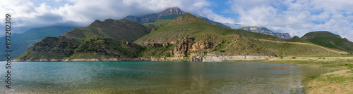 Panorama of Lake Gizhgit in a mountain landscape. Republic of Kabardino-Balkaria, Russia photo