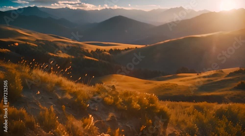 Golden Hour Serenity: A Panoramic View of Majestic Peaks Basking in the Warm Embrace of the Setting Sun