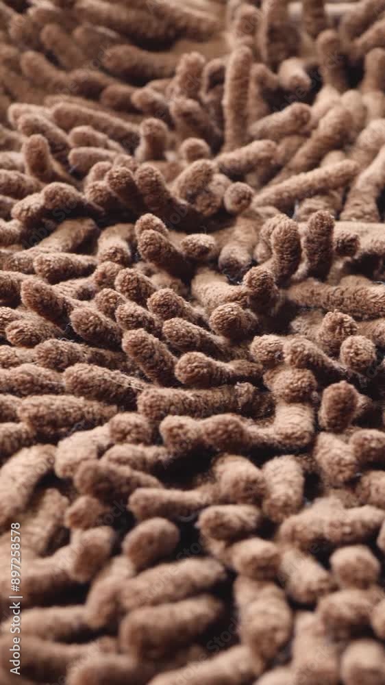 Brown micro fiber soft carpet. True macro close up, domestic texture. High absorbent fabric Brown micro fiber soft carpet. True macro close up, domestic texture. High absorbent fabric