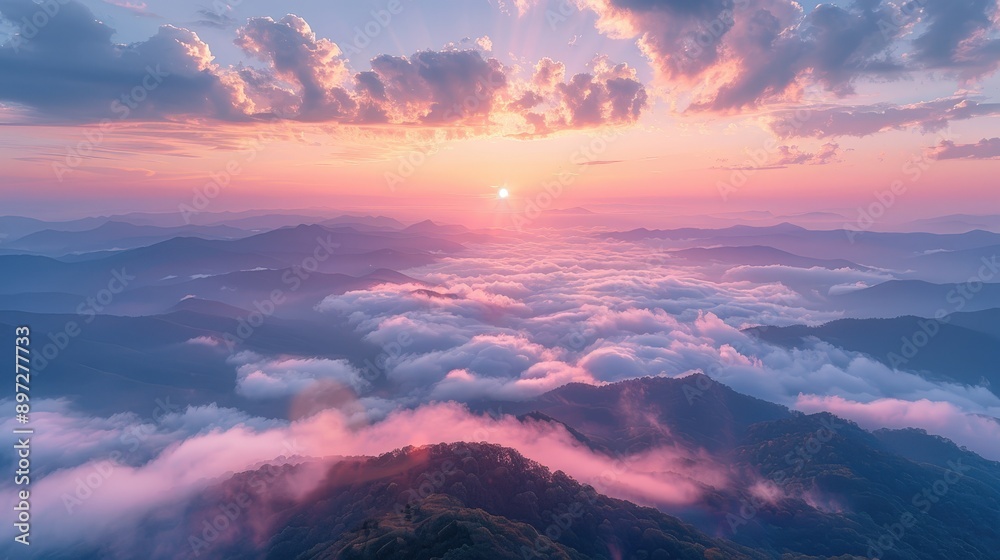 Fototapeta premium Majestic Sunset Over Misty Mountain Peaks