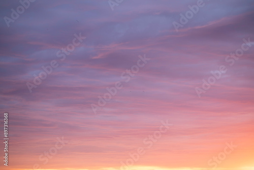 Sunrise sky above a city. Incredible natural colors. Red, orange, purple, dark blue. Heaven.