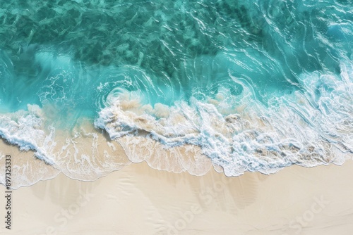 Aerial View of Turquoise Ocean Waves Crashing on White Sandy Beach © Hairilnizam