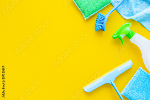 Tools and equipment for housework with cleaning products, top view