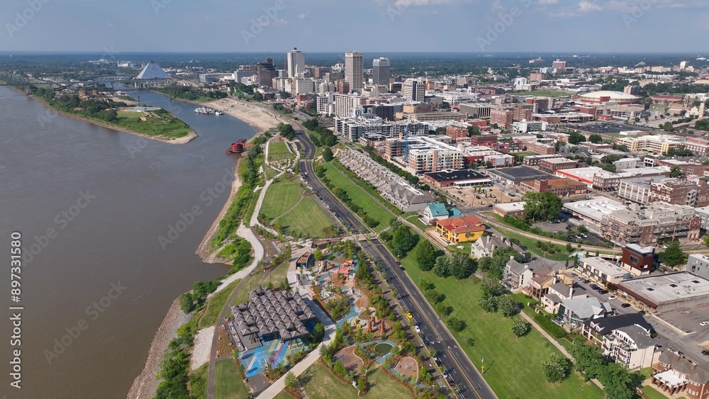 Fototapeta premium Beautiful Memphis, TN city skyline with outdoor parks, tall buildings, by Mississippi River in Southern USA