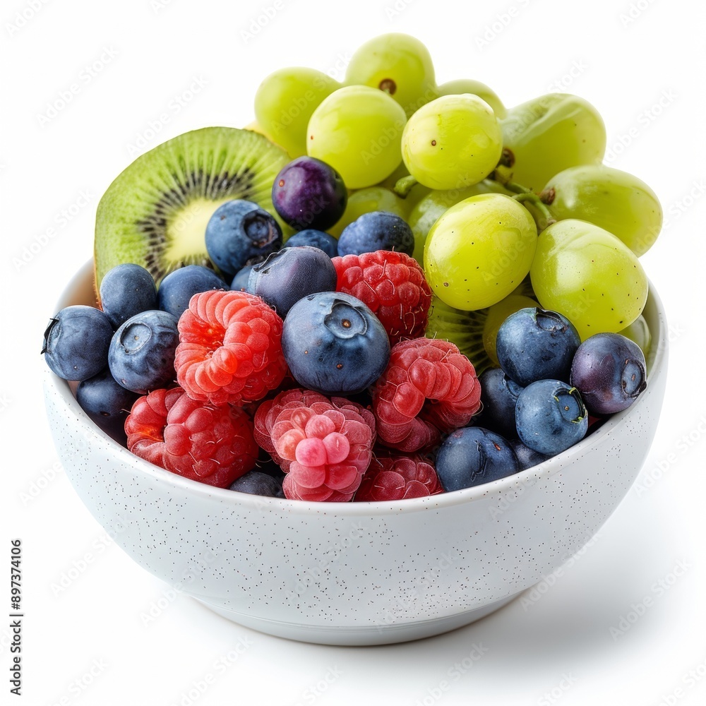 Refreshing Mixed Fruit Bowl with Grapes, Kiwi, and Blueberries on White Background with Copy Space Refreshing Mixed Fruit Bowl with Grapes, Kiwi, and Blueberries on White Background with Copy Space