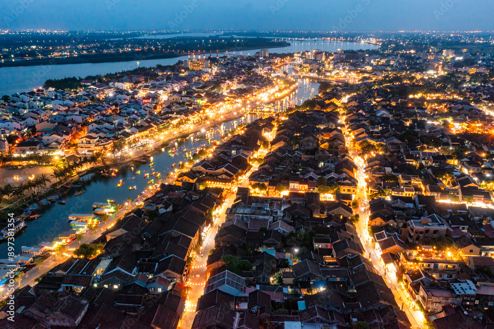 Obraz premium Aerial drone view of Hoi An city, Vietnam. Ancient town, UNESCO world heritage, at Quang Nam province.