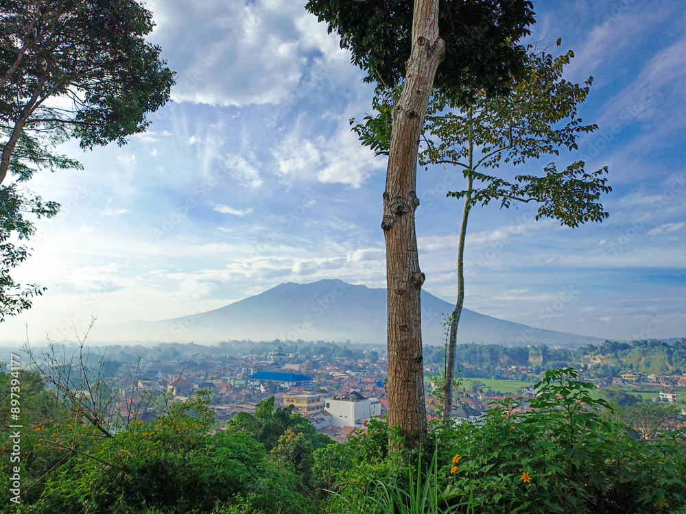 Obraz premium housing complex with a beautiful mountain background in the morning blue sky