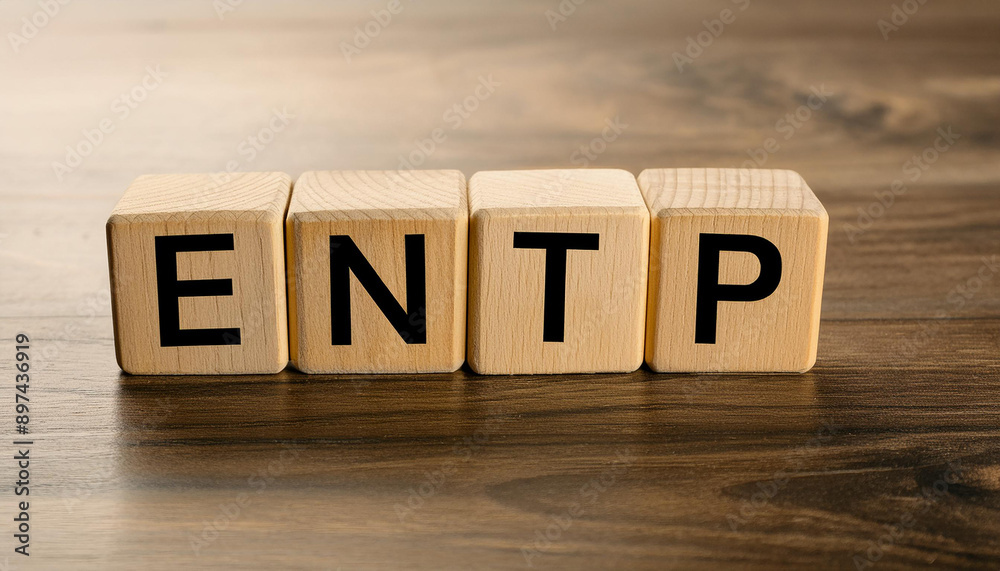 Wooden cubes with text ENTP. Extraverted, Intuitive, Thinking, Perceiving. Personality type.