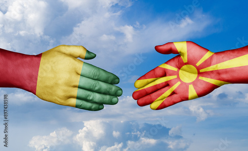 North Macedonia and  Guinea-Conakry country handshaking with flags, consensus concept international co-operation illustration