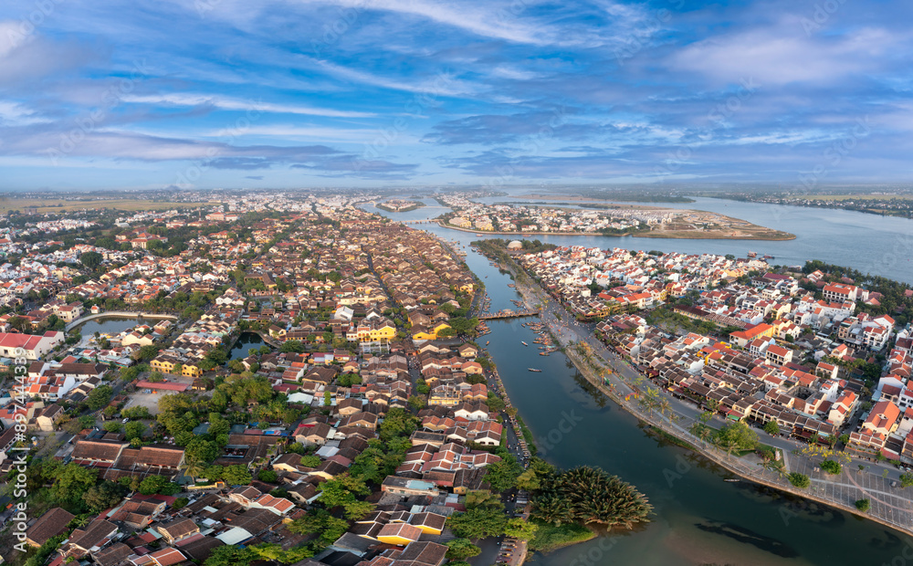 Fototapeta premium Aerial drone view of Hoi An city, Vietnam. Ancient town, UNESCO world heritage, at Quang Nam province.