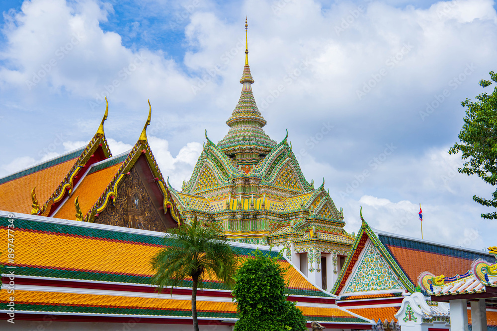 Fototapeta premium Picture of pagodas in Wat Pho in Bangkok, Thailand, one of Thailand's oldest temples.