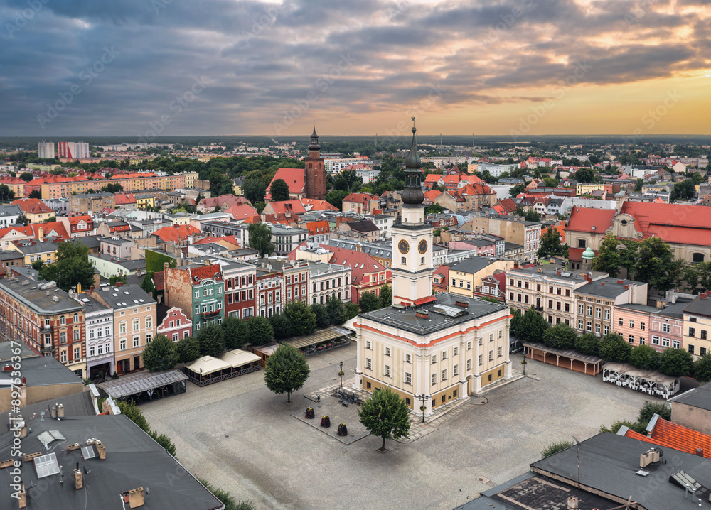 Aerial summer skyline cityscape of Leszno, Poland at sunset. Panoramic view of the old town market (Rynek) square and town hall (Ratusz)