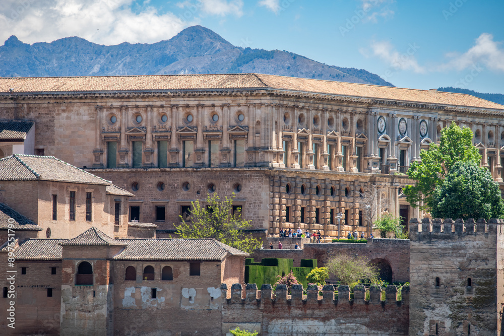 Fototapeta premium Palacio Carlos V in Granada Andalusia Spain with Beautiful Mountain View