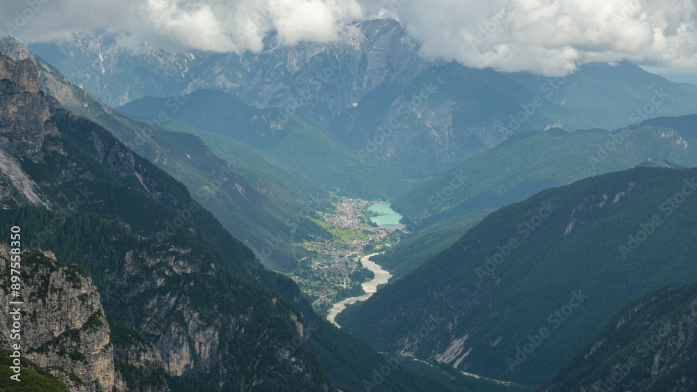 Obraz premium June Hike: Snow and Clouds on Tre Cime Circuit