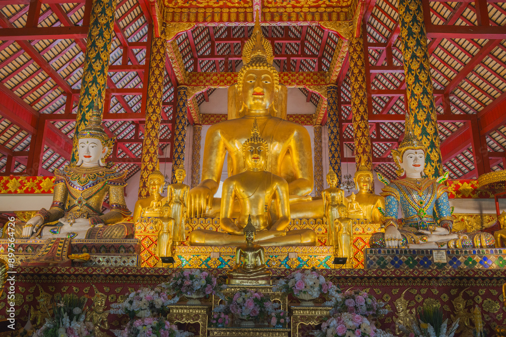 Fototapeta premium Golden Buddha statue at Wat Suan Dok