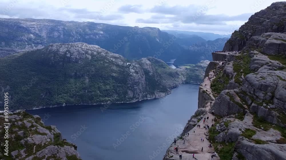 A drone's view captures the stunning panorama of the famous places of Norway, winding through high mountains