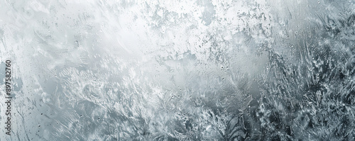 A frosted silver background with a subtle, diffused texture, creating a soft and elegant effect.