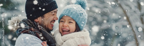 Father and Daughter Laughing in the Snow