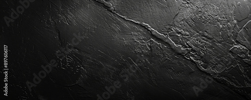 A bright black background with a soft, velvety finish, perfect for highlighting objects or text. photo