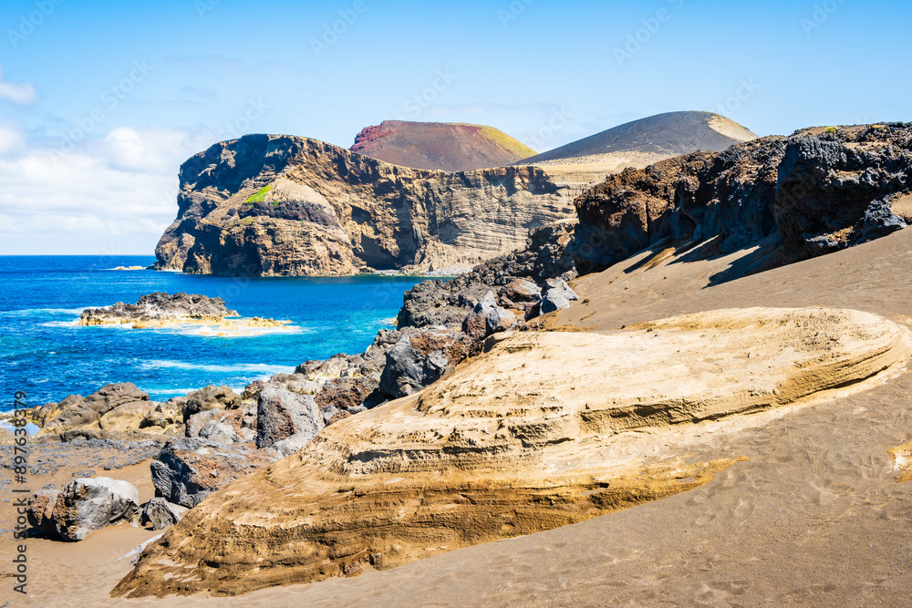 Beautiful view of Capelinhos peninsula volcanic ocean coast and cliffs, Faial island, Azores, Portugal Beautiful view of Capelinhos peninsula volcanic ocean coast and cliffs, Faial island, Azores, Portugal