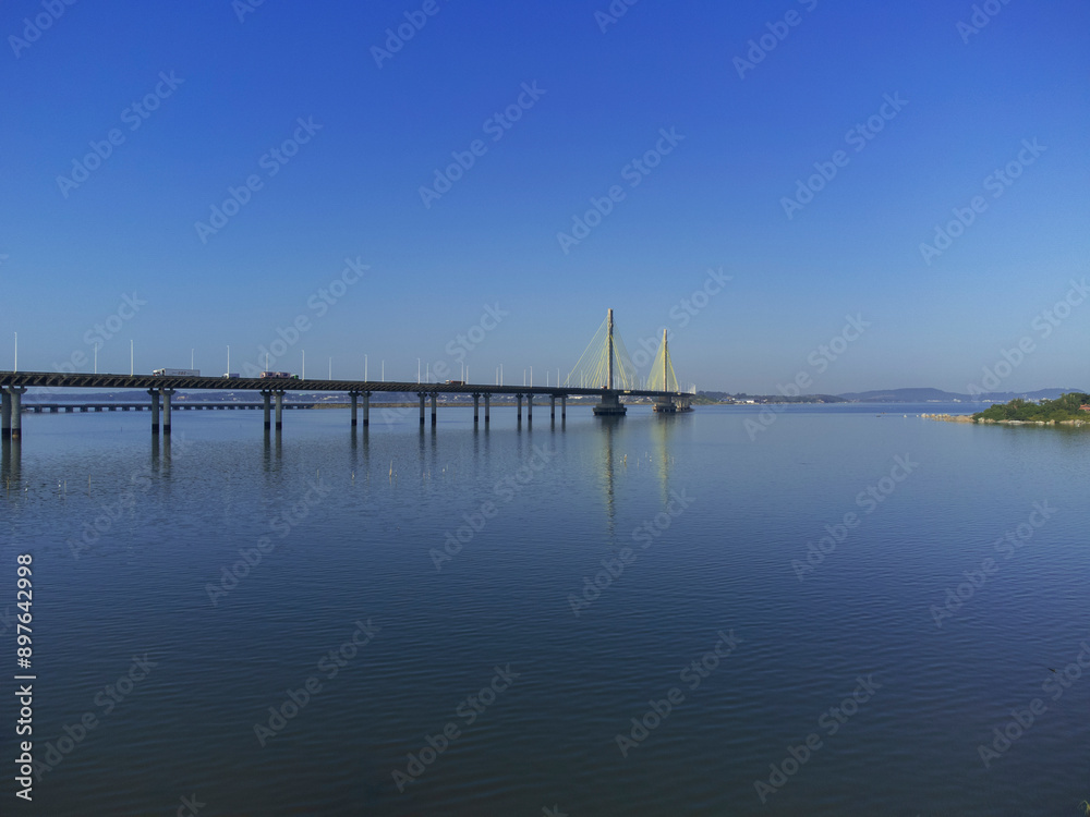 Anita Garibaldi Bridge in Laguna Santa Catarina Brazil. Bridge over the Imarui lagoon, highway 101. Anita Garibaldi Bridge in Laguna Santa Catarina Brazil. Bridge over the Imarui lagoon, highway 101.