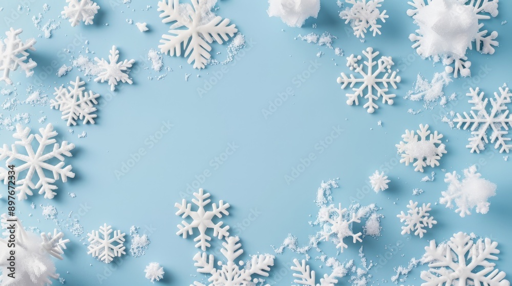 Winter themed square flat lay mockup with snowflake pattern on pastel blue background for invitation card design Winter themed square flat lay mockup with snowflake pattern on pastel blue background for invitation card design