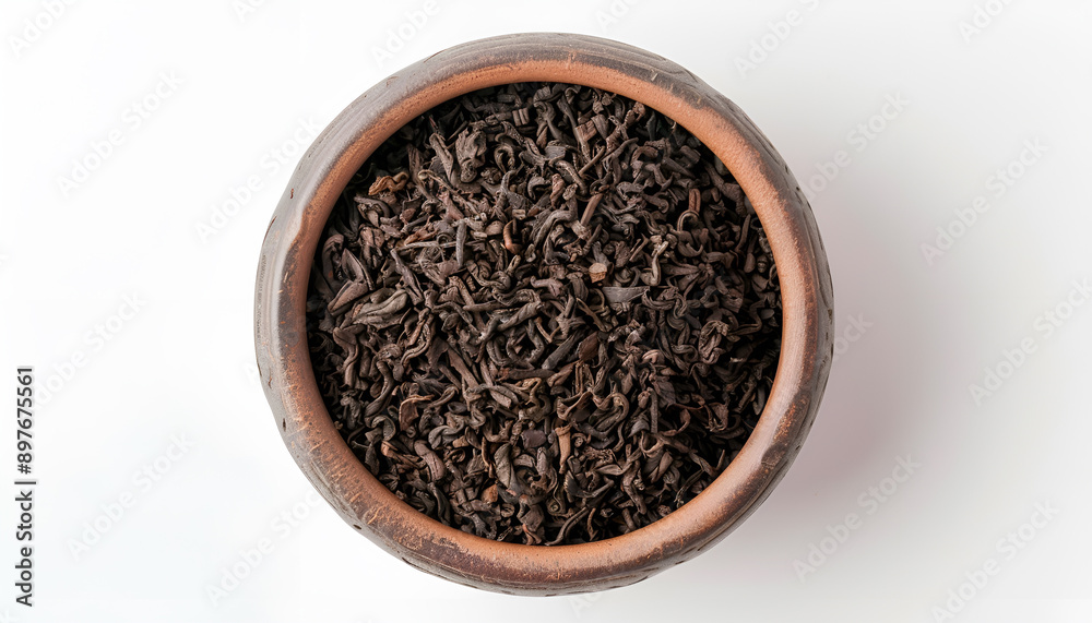 Bowl of traditional Chinese pu-erh tea leaves isolated on white, top view Bowl of traditional Chinese pu-erh tea leaves isolated on white, top view