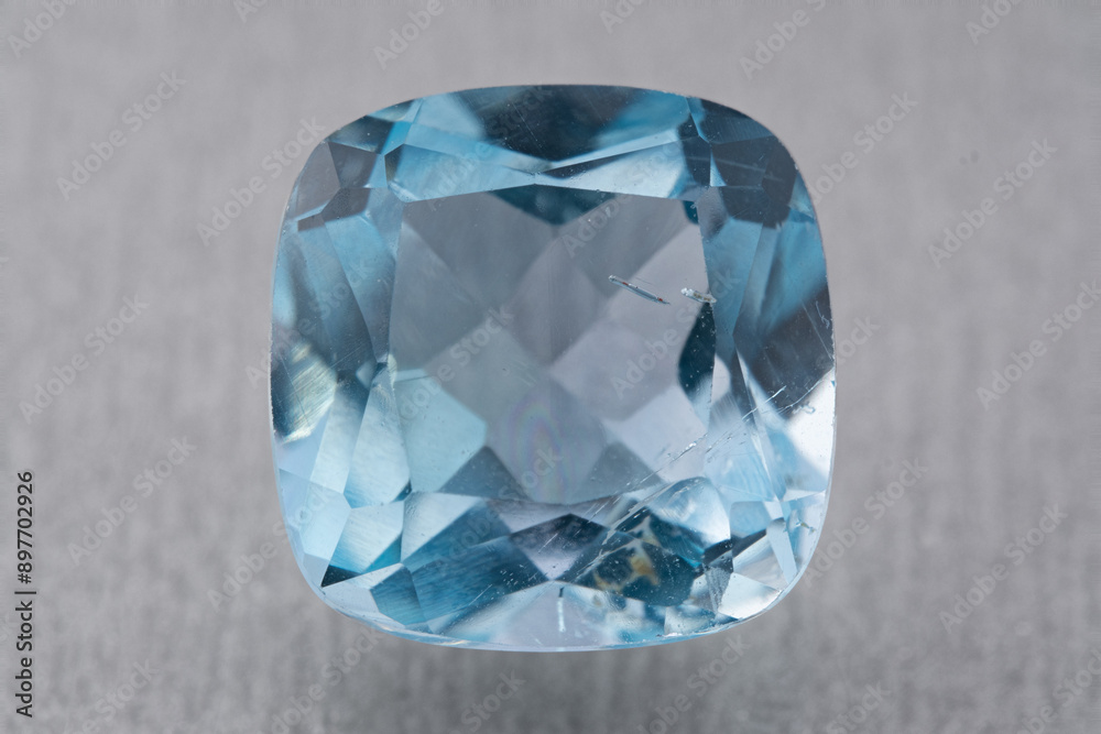 natural blue topaz gem on the isolated white background natural blue topaz gem on the isolated white background