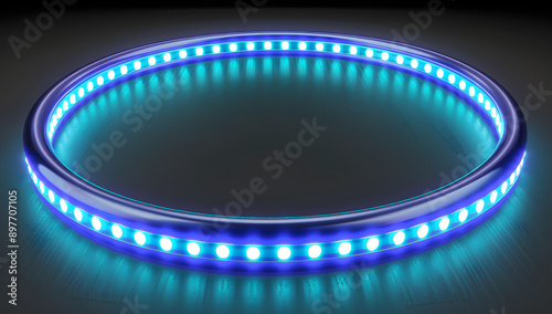 A glowing blue LED light ring on a dark surface, emitting a soft and futuristic glow, perfect for high-tech themes