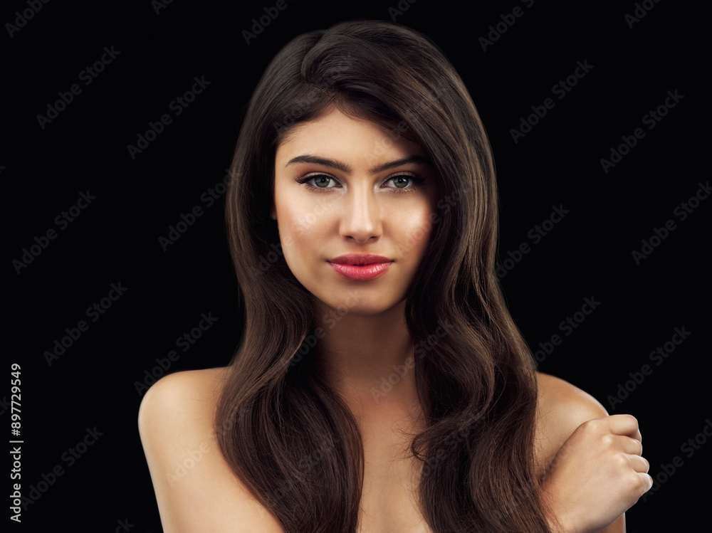 Fototapeta premium Confident, woman and portrait with hair care in studio for salon treatment, results and satisfaction. Relax, calm and person with pride for shampoo shine, growth and hairstyle on black background