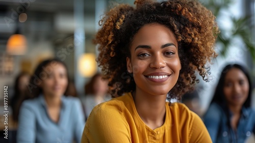 Confident Leader, Bright Future: A young Black woman beams with pride, her contagious smile radiating leadership and positivity amidst a diverse team in a modern office setting. 