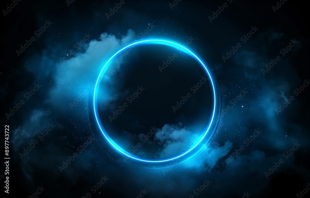 Fototapeta premium A luminous blue circle surrounds a dark center, set against a backdrop of cosmic clouds and stars, evoking a sense of futuristic or sci-fi ambiance.