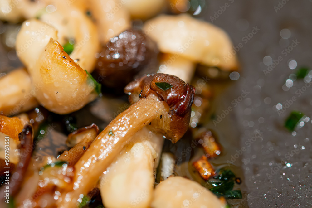 Roasted with onion white and brown shimeji edible mushrooms native to East Asia, buna-shimeji is widely cultivated and rich umami tasting compounds Roasted with onion white and brown shimeji edible mushrooms native to East Asia, buna-shimeji is widely cultivated and rich umami tasting compounds