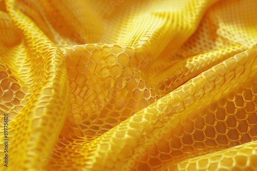 Texture macro photo of yellow soccer fabric photo