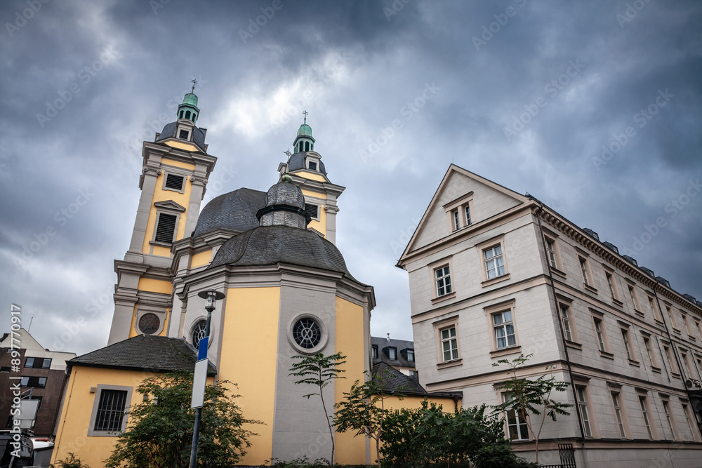 Main facade of the church of Saint Andreas, also called Sankt Andreas Kirche, in the city center of Dusseldorf, Germany. St Andreas is a roman catholic church belonging to the Dominicans. Main facade of the church of Saint Andreas, also called Sankt Andreas Kirche, in the city center of Dusseldorf, Germany. St Andreas is a roman catholic church belonging to the Dominicans.