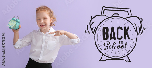 Cute little schoolgirl with...