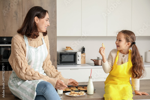 Young mother and her little...