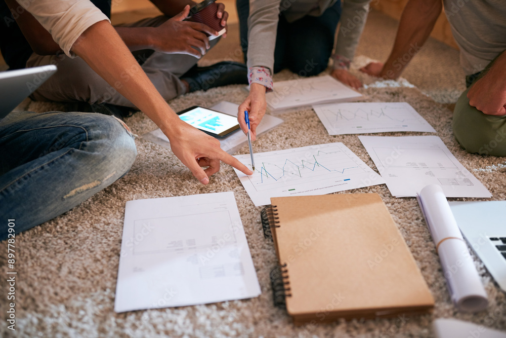 Business people, hands and meeting with paperwork, data analysis and brainstorming strategy on office floor. Closeup, employees and analytics documents for revenue report, planning and growth review Business people, hands and meeting with paperwork, data analysis and brainstorming strategy on office floor. Closeup, employees and analytics documents for revenue report, planning and growth review