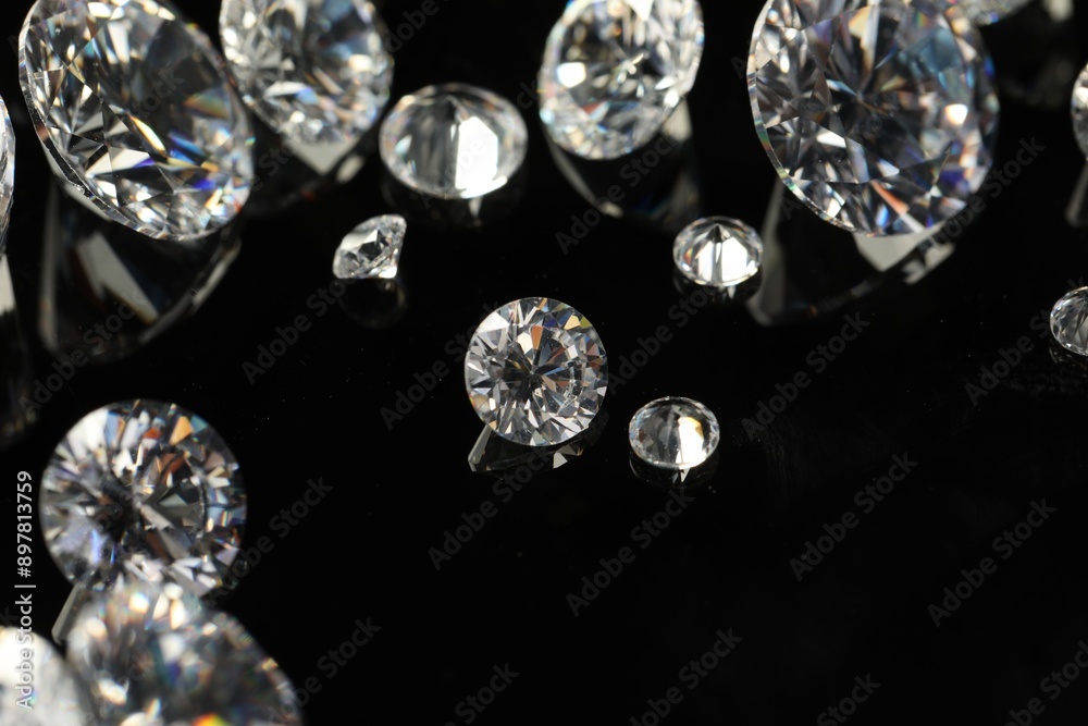 Many beautiful shiny diamonds on black mirror surface, closeup Many beautiful shiny diamonds on black mirror surface, closeup