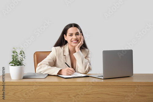 Pretty businesswoman with l...