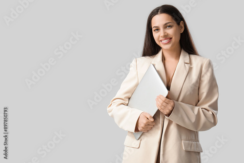 Pretty businesswoman with l...