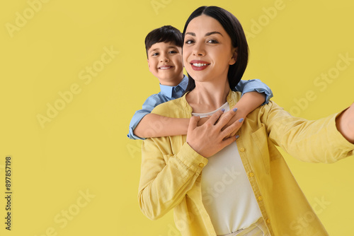 Little boy hugging his moth...