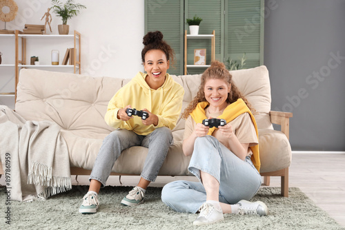 Young women playing video g...