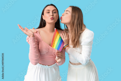 Two young women celebrating...