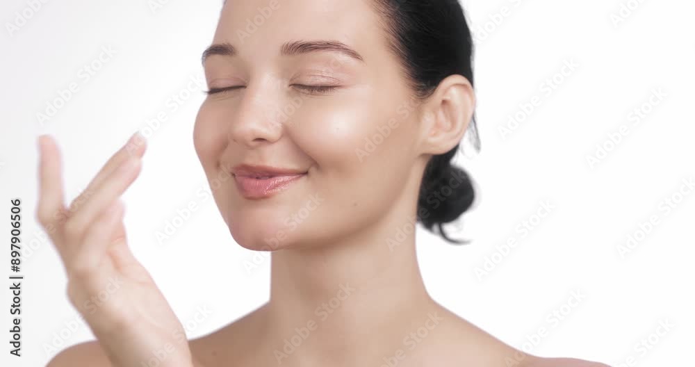 Smiling Woman Applying Skincare Product For Self-Care Routine Smiling Woman Applying Skincare Product For Self-Care Routine
